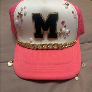Pink trucker hat with “M” initial custom made